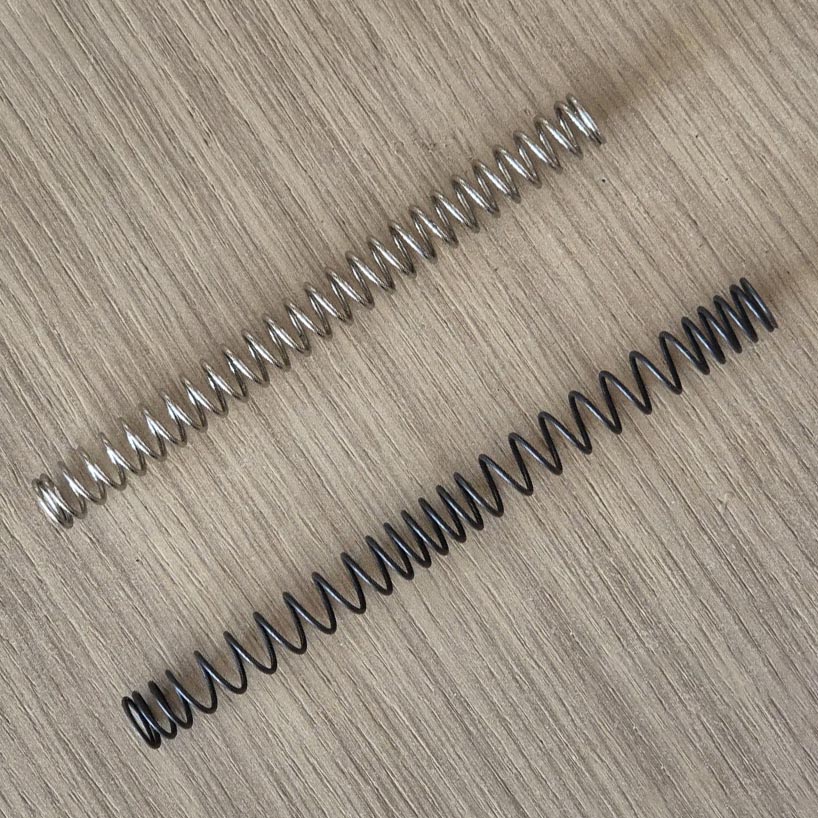 A linear and a progressive spring of equal power (1.8 J)
